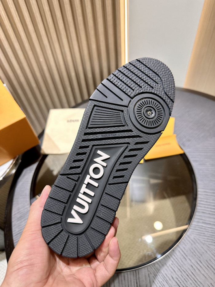 l**is V*t*n trainer black embossed monogram