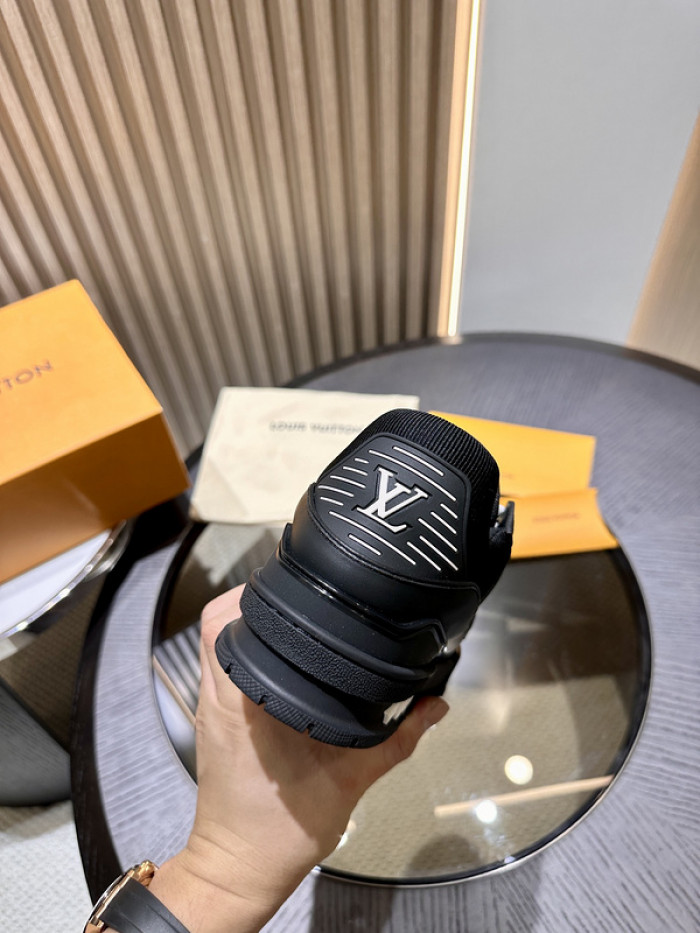 l**is V*t*n trainer black embossed monogram