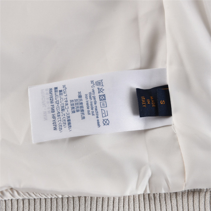 l**is V*t*n multi-patches mixed leather varsity blouson milky white