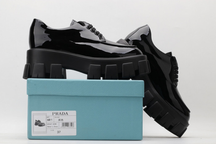 prad patent leather and nylon lace-up shoes