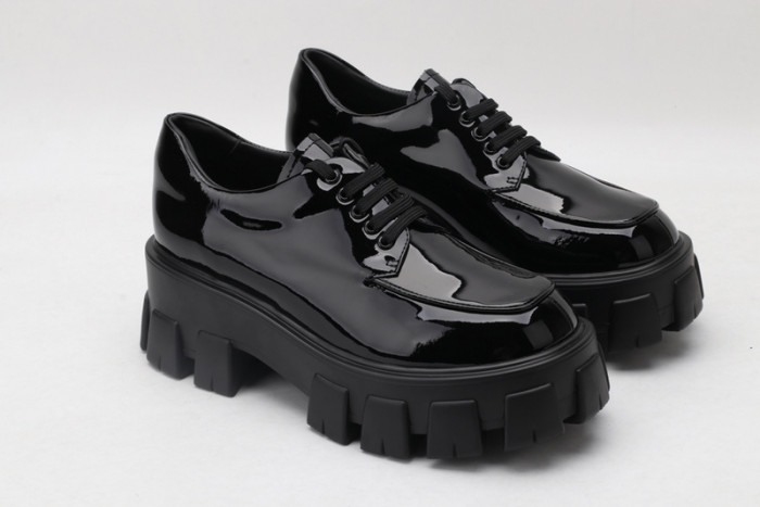 prad patent leather and nylon lace-up shoes
